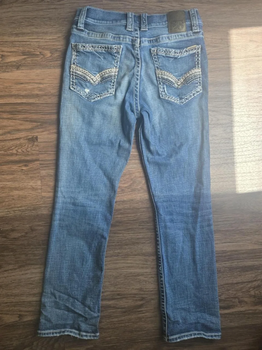 Distressed Blue Denim Jeans